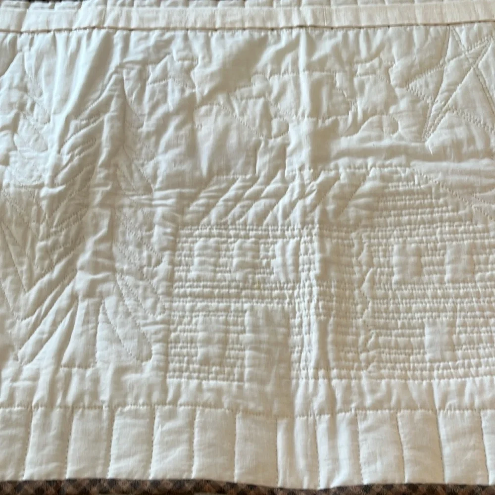 Handmade quilt wall hanging.